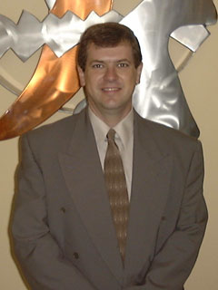 Professor Brian Coomes, Ph.D.